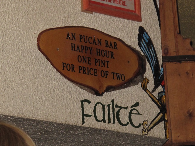 One pint for the price of two reads a sign on the wall.