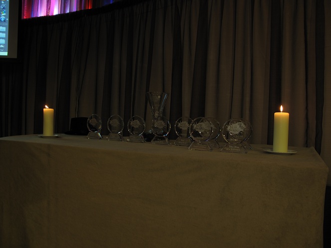 A table covered in cloth with candles on each end.  It's like an alter.