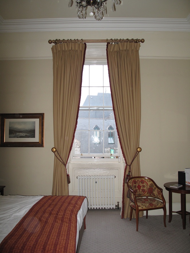 Shows the massive window in this hotel room.