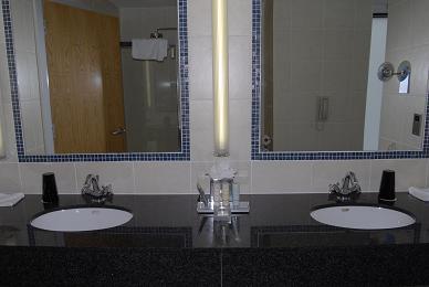 A picture of the two sinks in  the bathroom.  Emma thought this was really cool. I think she wants this.