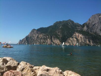 picture of a wider part of the lake with mountains on the other side.